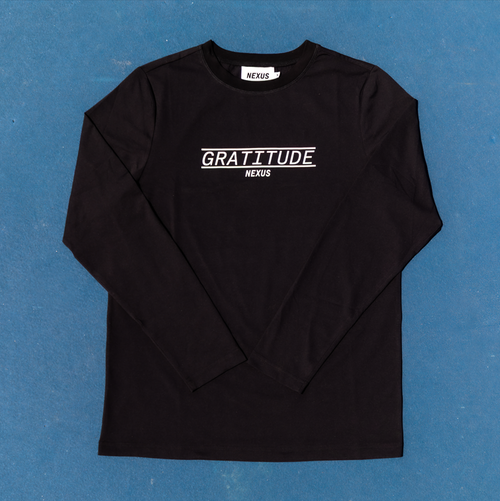 Black long-sleeve shirt with 'GRATITUDE' text on a blue background