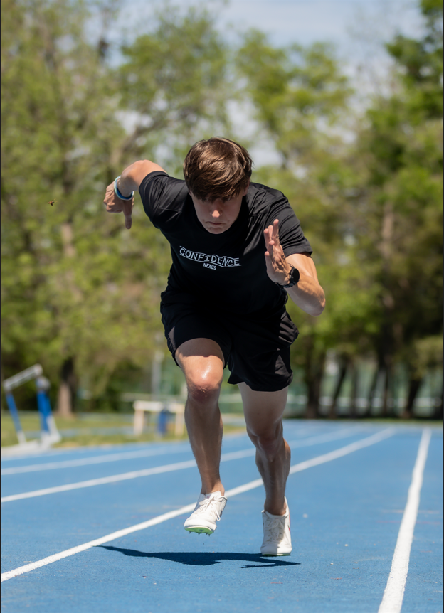 Person running on a track with a photo editing software interface in the foreground